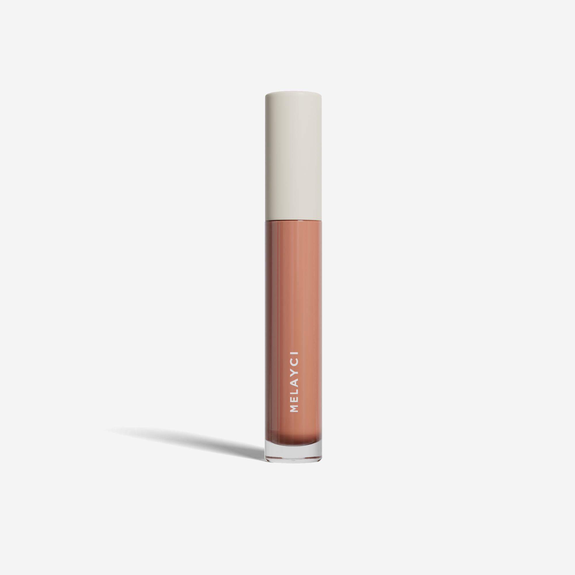 Packshot du gloss à lèvres éclat nourrissant Melayci, teinte Peach, montrant le flacon du produit.
