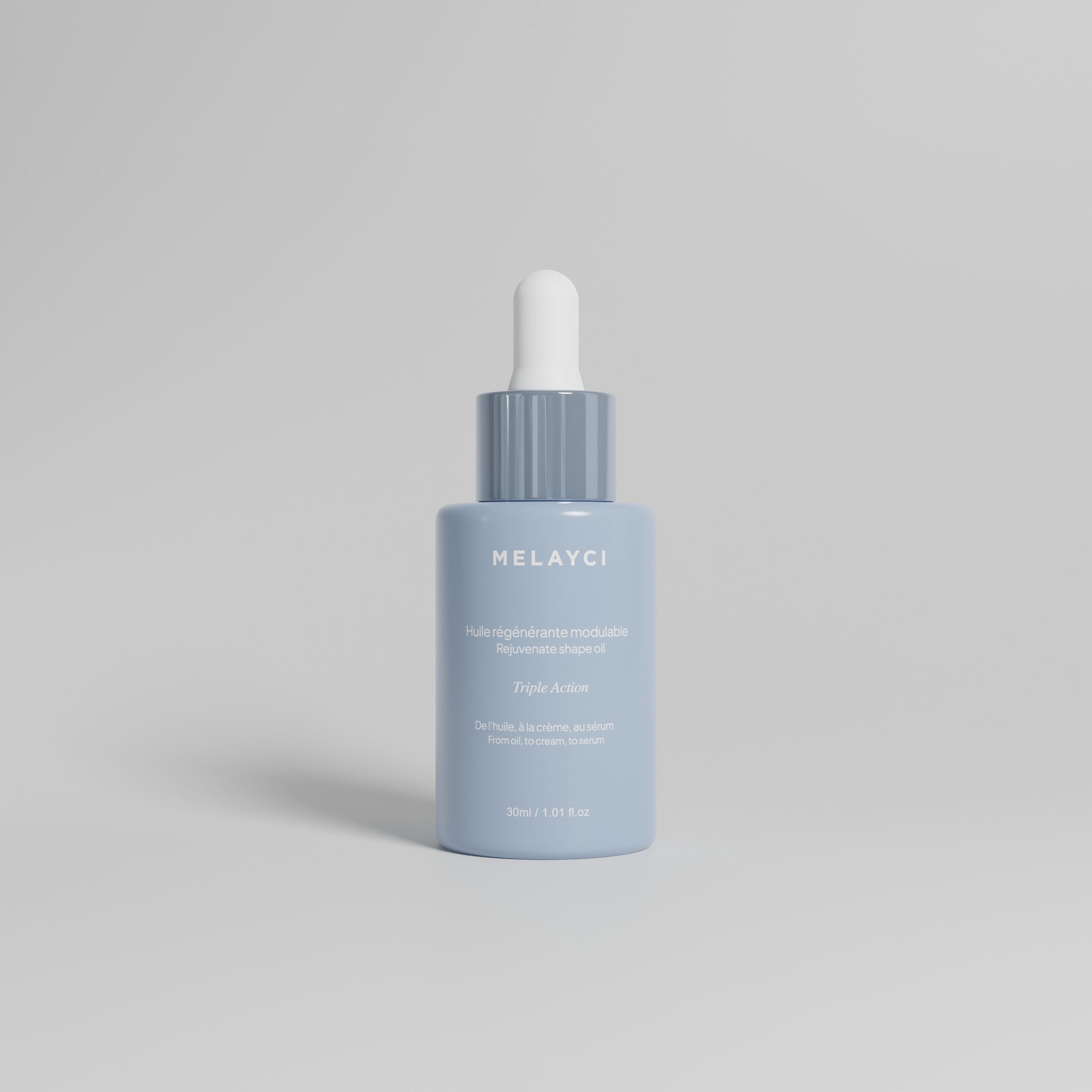 Packshot de l’huile visage modulable Melayci, montrant le flacon du produit.
